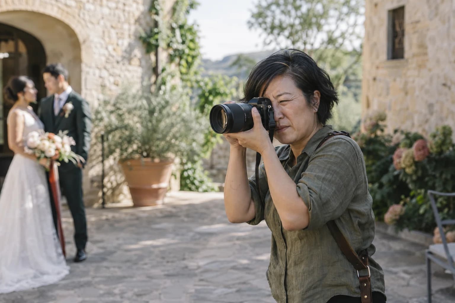 A photographer working with a client during a portrait session